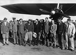 Managers: Pilots in front of a Ford airplane after a test flight, 1927