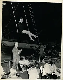 Shadwell: Pinito, circus acrobat, rehearses with orchestra, London