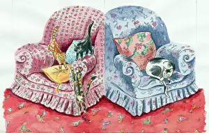 Armchairs: Pink and blue arm chairs with four cats