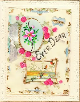 Creamy: Pink roses and robins on a greetings card