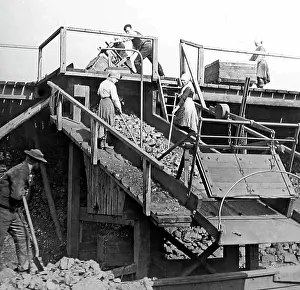 Lass: Pit lasses working on a scree at an English coal mine
