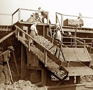 Lass: Pit lasses working on a scree at an English coal mine