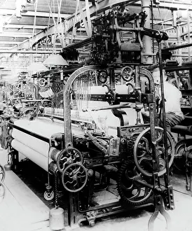 Coating: Plain coating loom in a woollen mill in Bradford