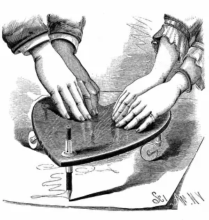 Seance: Planchette or Ouija board, 1885. Method of using