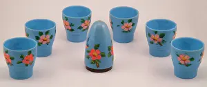 Shaker: Plastic painted egg cups and salt cellar