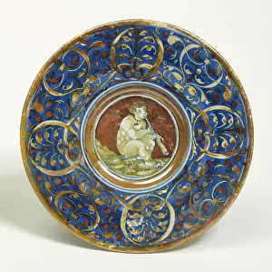 Maiolica: Plate: Cupid playing the flute