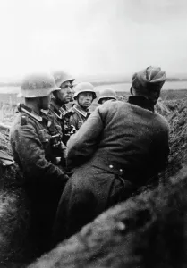 Commissioned: Platoon leader instructs noncommissioned officers on the