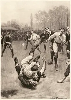 Tackling: Player making a tackle in a Rugby Game