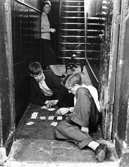 PLAYING CARDS IN DOORWAY