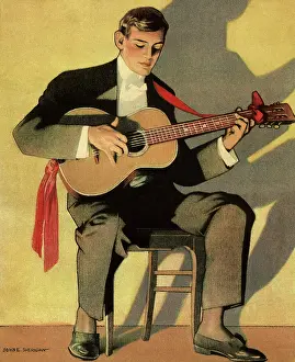Tassled: Playing Guitar