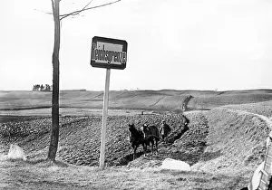 Plowing: Plowing farmer on the German-Polish border