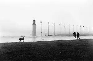 Flagpoles: Plymouth Hoe, Devon, on a wet day