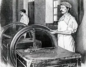 Placing: Pneumatic tyres: placing rubber over canvas foundation