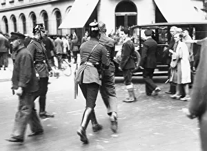 Dissolve: Police dissolves a student demonstration, 1932