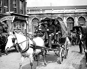 Smithfield: Police escorting cart during Dock Strike, London