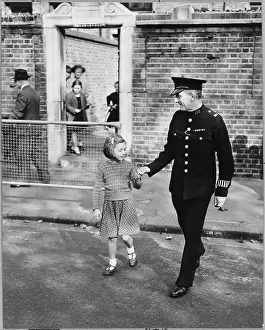 POLICE OFFICER AND CHILD