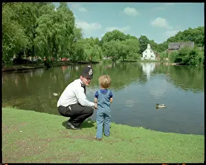 POLICE OFFICER AND CHILD