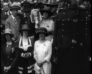 Eamon: Police Officer and Crowd Gathering At Downing