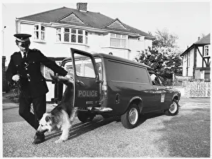 POLICE OFFICER AND DOG