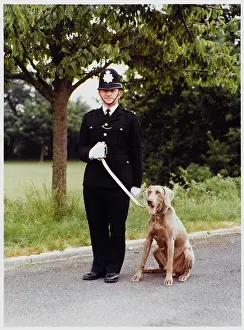 POLICE OFFICER AND DOG