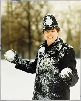 Snowballs: POLICE OFFICER IN SNOW
