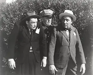 Trespass: Policeman arresting two men