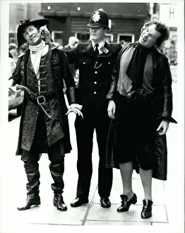 Arrests: Policeman with Beggar's Opera performers, London