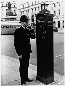 POLICEMAN AND CALL BOX