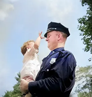 Marjory: policeman - cop - child