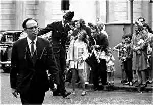 Kneed: POLICEMAN DIRECTS GIRL