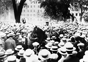 Sacco: Policeman drives his horse through the crowds on