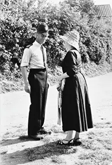 Sunhat: Policeman with Imogen Holst at Aldeburgh