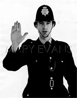 Oncoming: POLICEMAN SIGNS STOP'!