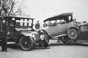 Policeman standing guard at a traffic pileup