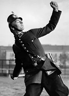 Apprentice: Policeman throwing a hand grenade, 1935