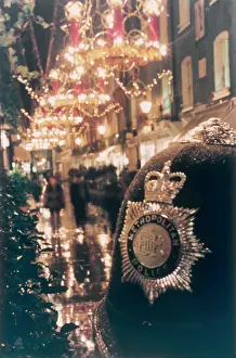Shoppers: Policeman's helmet with Christmas lights