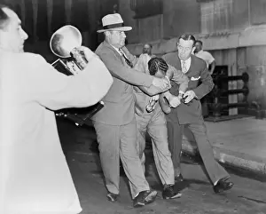 Lineup: Two policemen forcibly escorting Vincent ?