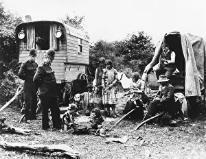 Caravans: Policemen talk to gypsies on Epsom Downs