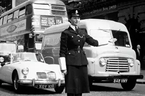 Cuffs: Policewoman on traffic duty