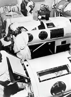 Polio patients being treated with iron lungs ?