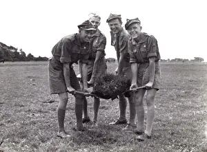 Turf: Polish Scouts carrying turf