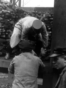 Depict: Political leader transporting coal, 1939