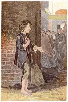World History Archive: Poor boy, shoeless and in rags, begging on a street