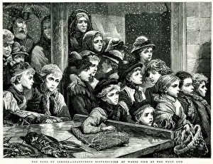 Fishmonger: Poor people wait for leftovers from the fishmonger