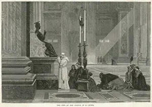 Prays: Pope Pius IX prays at the Statue of St Peter