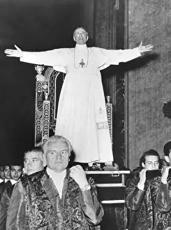 Pacelli: Pope Pius XII standing before his Sedia Gestatoria