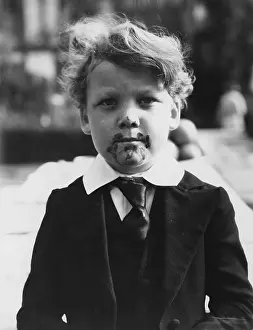 Swedes: Portrait of boy with food on his face