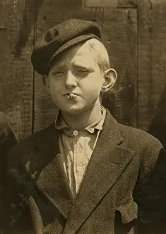 Skeeters: Portrait of a boy smoking, original caption: ?