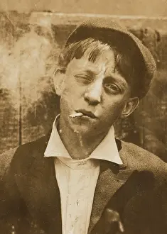 Skeeters: Portrait of a boy smoking, original caption: ?