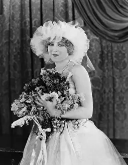 Marrying: Portrait of bride with bouquet